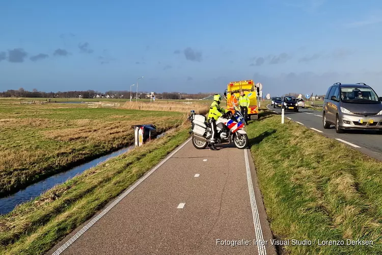 Auto te water langs N203 bij Castricum