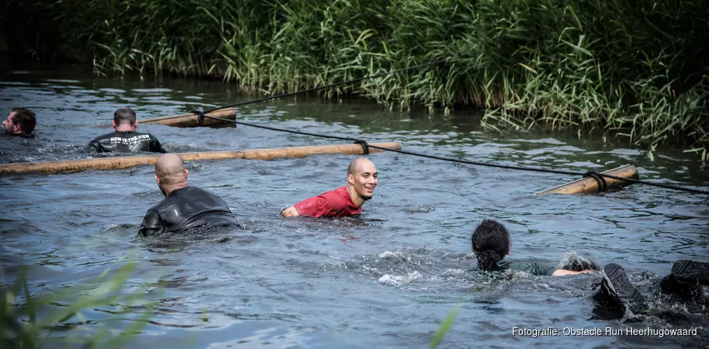 Ron Vlaar (AZ) en Nadine Broersen (WK atletiek)  bij Obstacle Run Heerhugowaard